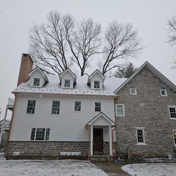 Inn on Church Road in the Snow