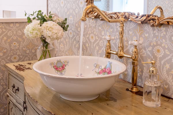 An antique vessel sink in the The Brookside Room bathroom at our Hershey bed and breakfast