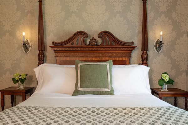 An antique four poster bed in the Pecan Room at our Hershey bed and breakfast